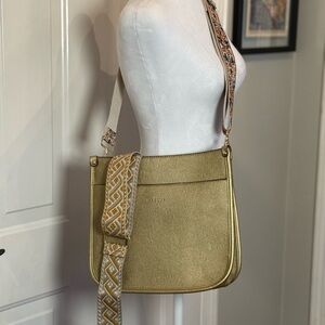 Chic Gold Crossbody Bag with Patterned Strap